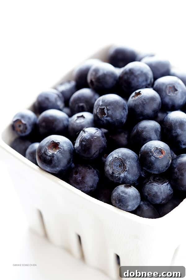 Fresh blueberries waiting to be used for the vibrant margarita recipe.