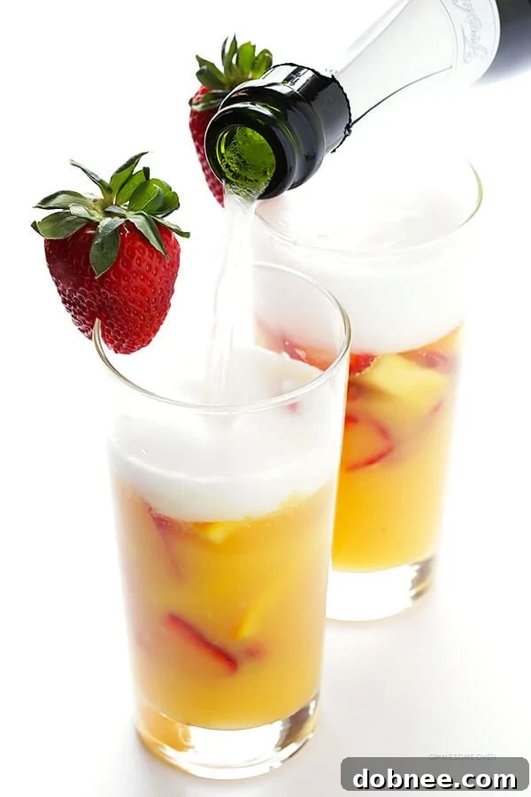Mimosa Sangria -- quick and easy to make, and kicked up a notch with lots of delicious fresh fruit! | dobnee.com