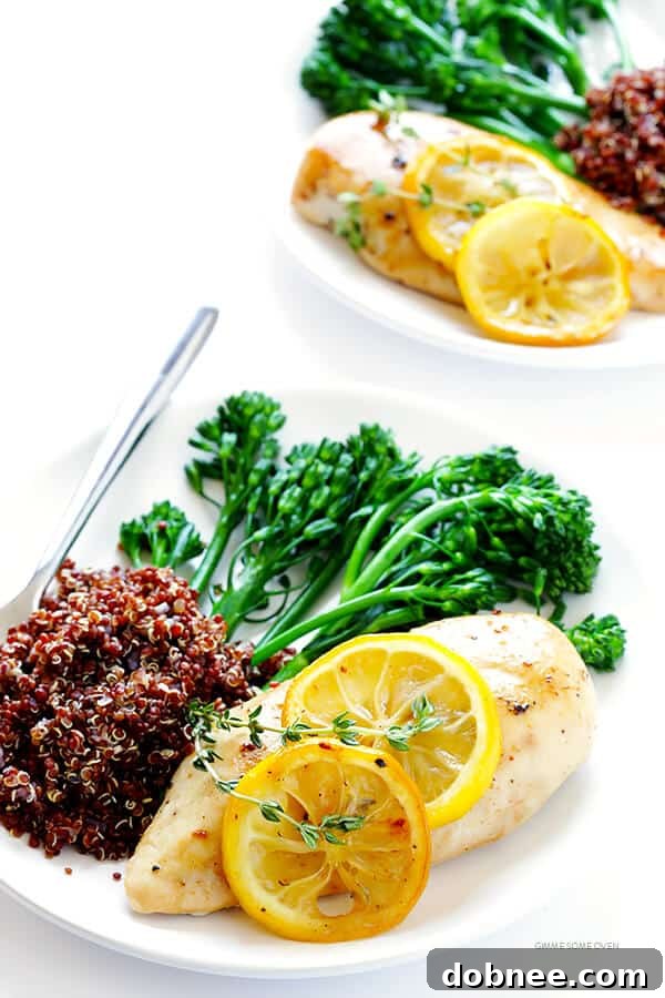 Zesty Lemon Roasted Chicken 7 Sliced baked lemon chicken served with fresh lemon wedges and herbs