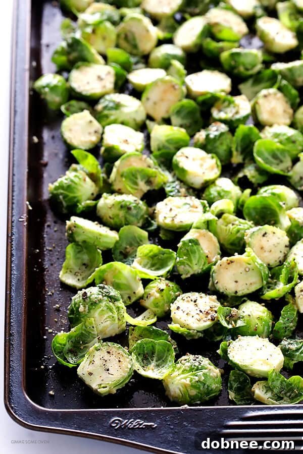 Crispy Miso Brussels Sprouts 7 Brussels sprouts coated in miso vinaigrette, spread evenly on a baking sheet for roasting. (Gluten-Free, Vegan, Vegetarian)