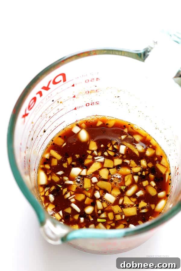 A close-up view of the quick and easy 20-Minute Teriyaki Chicken, showcasing the tender chicken coated in a glossy, honey-sweetened homemade teriyaki sauce.