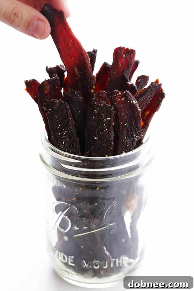 Seriously The BEST Beef Jerky Recipe -- easy to make at home, nice and savory and peppery, and SO delicious! | gimmesomeoven.com