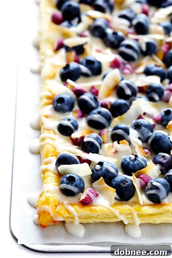 This Super-Easy Blueberry Almond Tart is surprisingly simple to make, easily to customize with your favorite fruits and toppings, and it's perfect for brunch or dessert anytime!