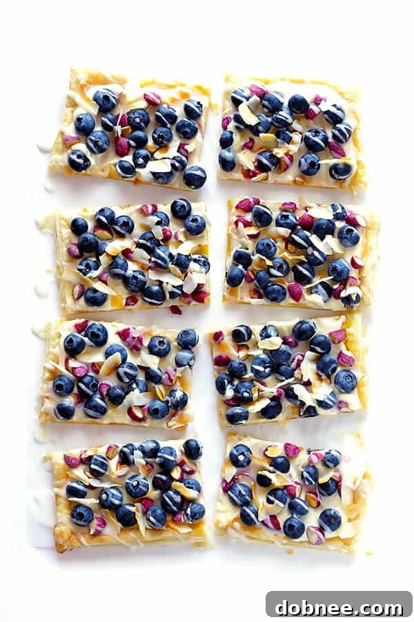 This Super-Easy Blueberry Almond Tart is surprisingly simple to make, easily to customize with your favorite fruits and toppings, and it's perfect for brunch or brunch anytime! | gimmesomeoven.com