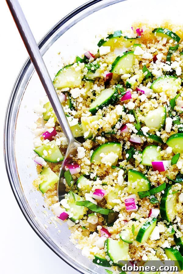 A vibrant Cucumber Quinoa Salad with fresh basil, crumbled feta, and diced red onion, all tossed in a zesty lemon Italian vinaigrette. Perfect for a healthy, make-ahead meal or side dish.