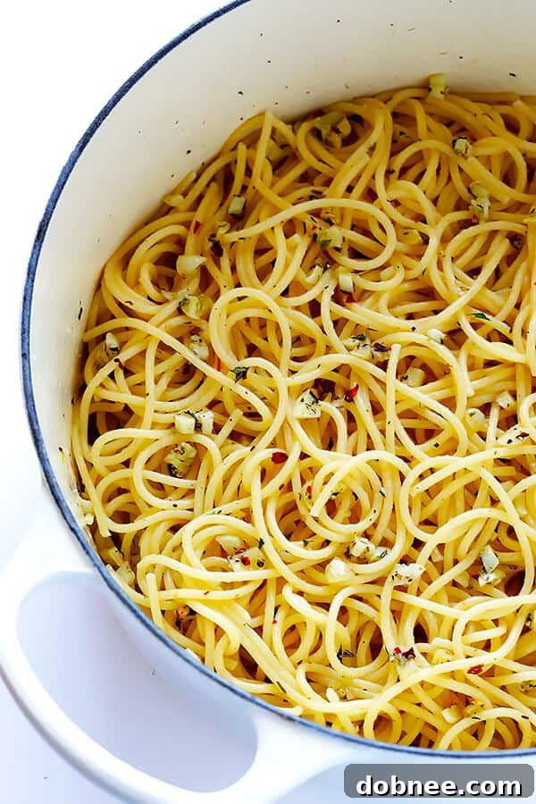 Freshly cooked Garlic Lovers' Spaghetti tossed in buttery garlic sauce, ready to serve.