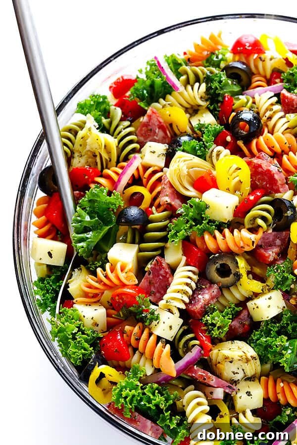 Vibrant Rainbow Antipasto Pasta Salad with a Zesty Italian Herb Vinaigrette