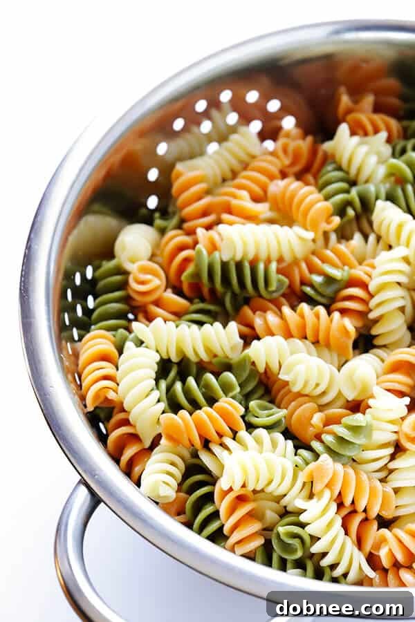 Preparing the vibrant ingredients for Rainbow Antipasto Pasta Salad