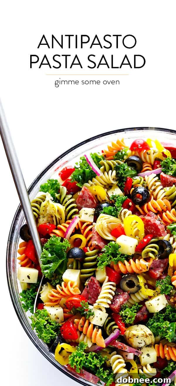 A large serving bowl filled with colorful Rainbow Antipasto Pasta Salad