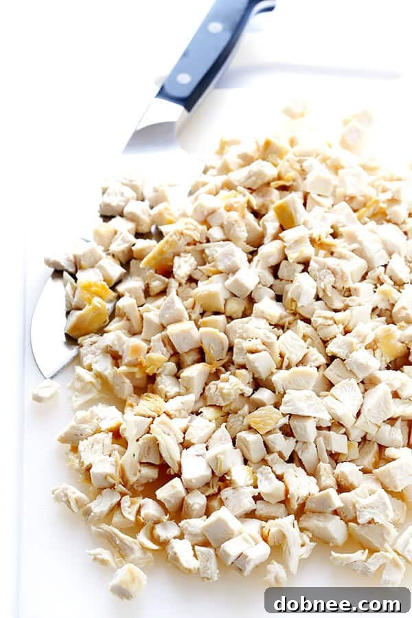 Preparing the naturally sweetened orange sauce for healthy chicken lettuce wraps, featuring Florida's Natural Orange Juice and honey.