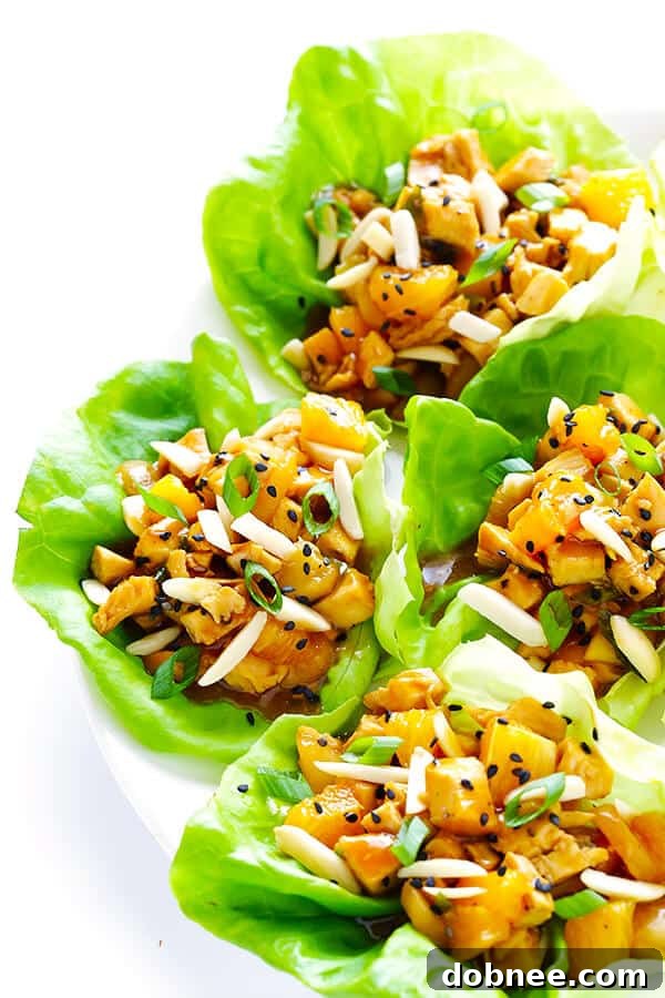 Mixing the orange chicken filling in a sauté pan before serving it in lettuce wraps. Quick, easy, and full of flavor.