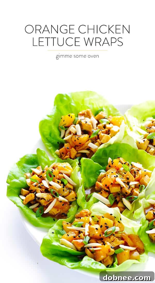 Close-up of a fresh and delicious Orange Chicken Lettuce Wrap, showcasing the vibrant ingredients.