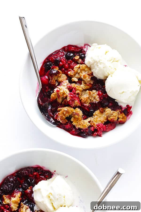 Mixed Berry Almond Crisp -- easy to make with any fresh berries you have on hand, and SO delicious and perfect for summer! (Gluten-free + Vegetarian + Vegan) | gimmesomeoven.com
