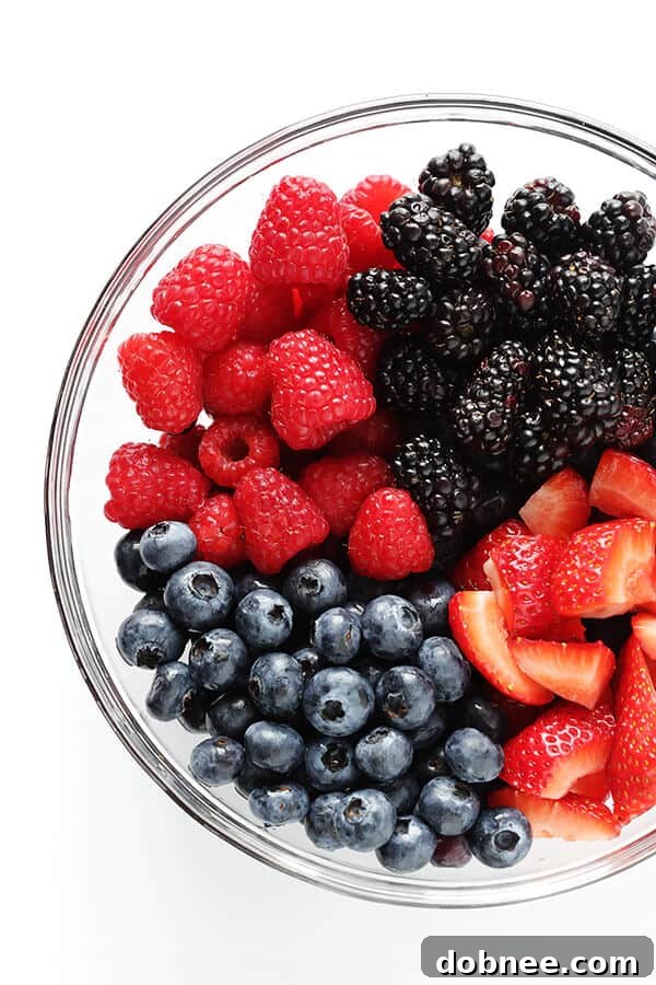 Mixed Berry Almond Crisp -- easy to make with any fresh berries you have on hand, and SO delicious and perfect for summer! (Gluten-free + Vegetarian + Vegan) | gimmesomeoven.com