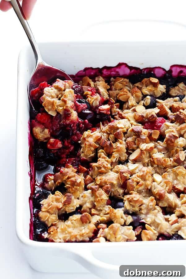Mixed Berry Almond Crisp -- easy to make with any fresh berries you have on hand, and SO delicious and perfect for summer! (Gluten-free + Vegetarian + Vegan) | gimmesomeoven.com