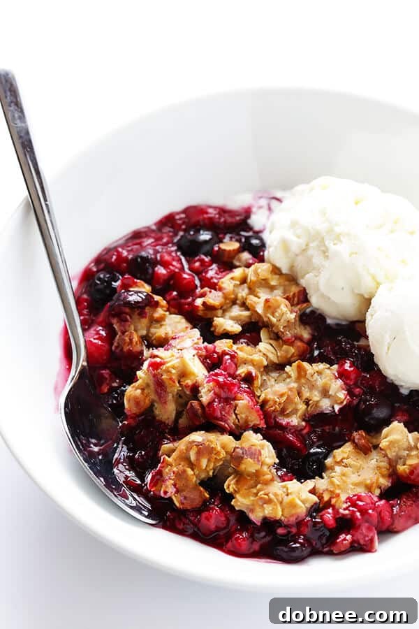Mixed Berry Almond Crisp -- easy to make with any fresh berries you have you hand, and SO delicious and perfect for summer! (Gluten-free + Vegetarian + Vegan) | gimmesomeoven.com