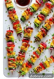 Grilled Rainbow Hawaiian Chicken Kabobs, a perfect summer meal.