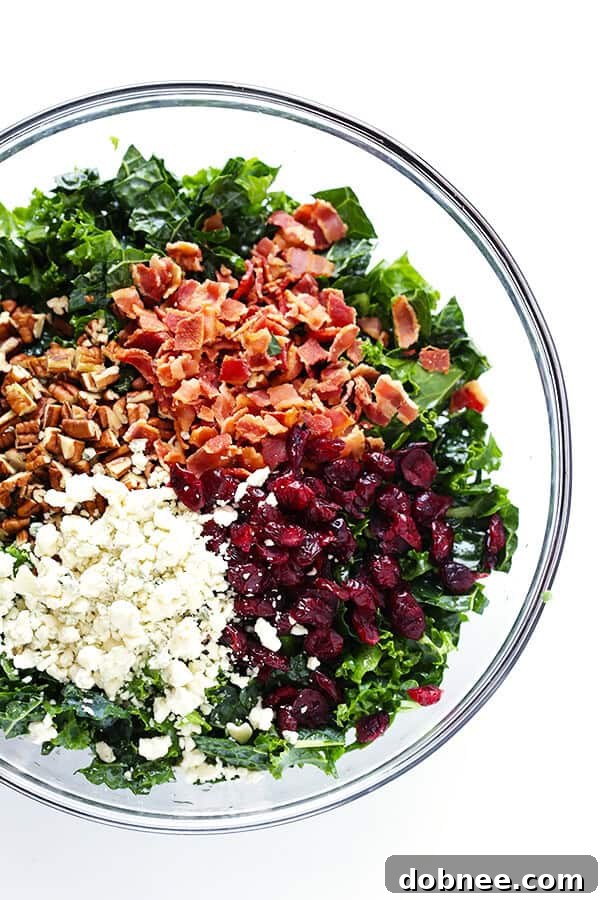 This Kale Salad with Bacon and Blue Cheese is quick and easy to make, tossed with a red wine shallot vinaigrette, and TOTALLY delicious. (Bonus, it holds up for hours in the fridge, if you want to make it ahead of time!) | gimmesomeoven.com