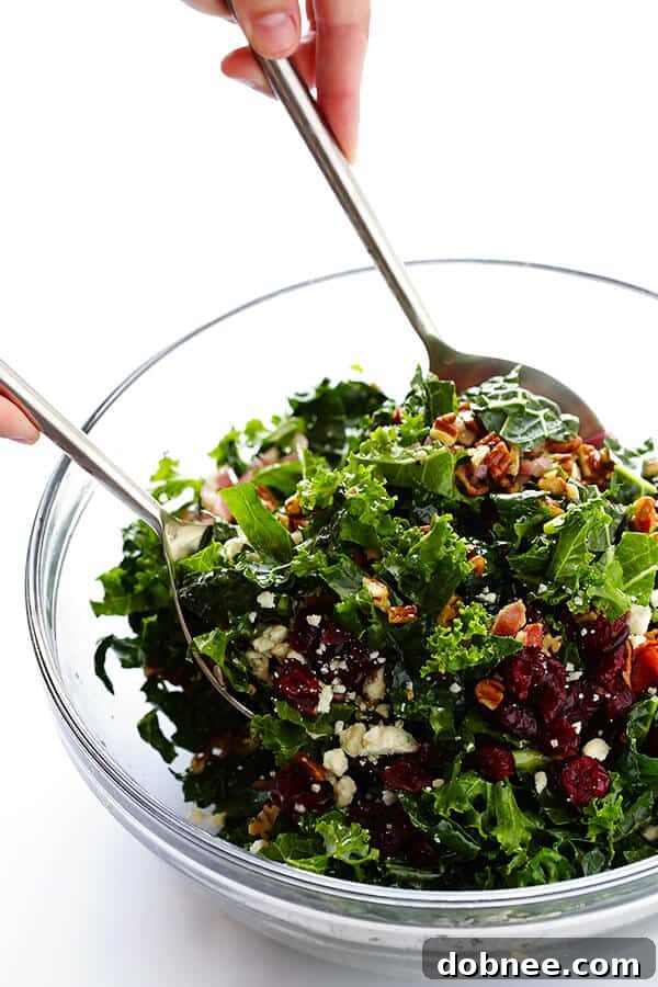 This Kale Salad with Bacon and Blue Cheese is quick and easy to make, tossed with a red wine shallot vinaigrette, and TOTALLY delicious. (Bonus, it holds up for hours in the fridge, if you want to make it ahead of time!) | gimmesomeoven.com