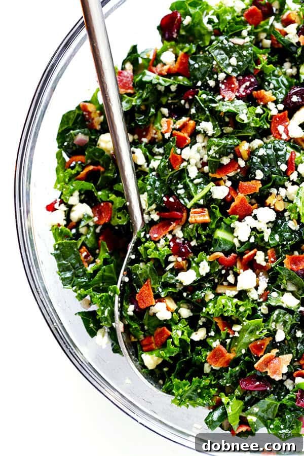 This Kale Salad with Bacon and Blue Cheese is quick and easy to make, tossed with a red wine shallot vinaigrette, and TOTALLY delicious. (Bonus, it holds up for hours in the fridge, if you want to make it ahead of time!) | gimmesomeoven.com