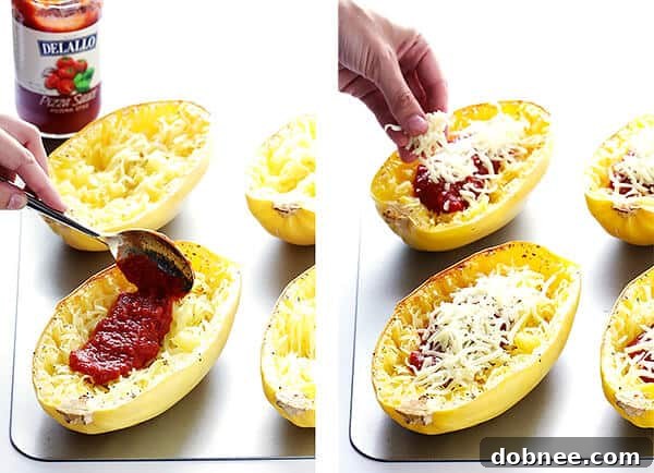 Pizza Night, Squash Style 5 Spaghetti squash flesh being shredded into spaghetti-like strands with a fork