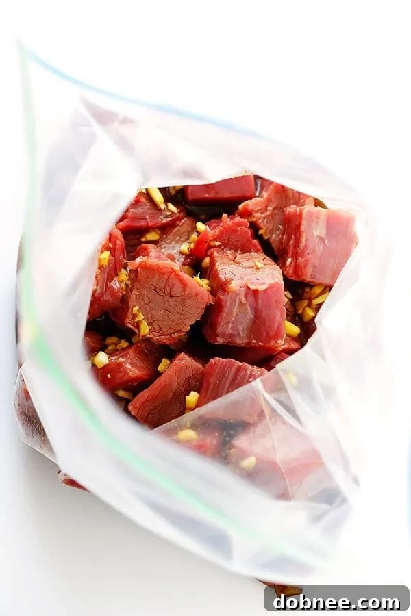 Preparing Korean Steak Kabobs with a homemade marinade. This super-easy recipe ensures flavorful and delicious grilled steak and vegetables. | dobnee.com