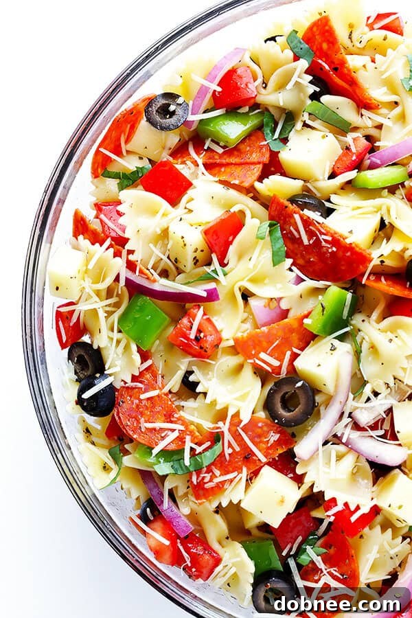 The finished Pizza Pasta Salad, vibrant and inviting, ready to be served. It's a perfect make-ahead dish for gatherings or a satisfying meal on its own.