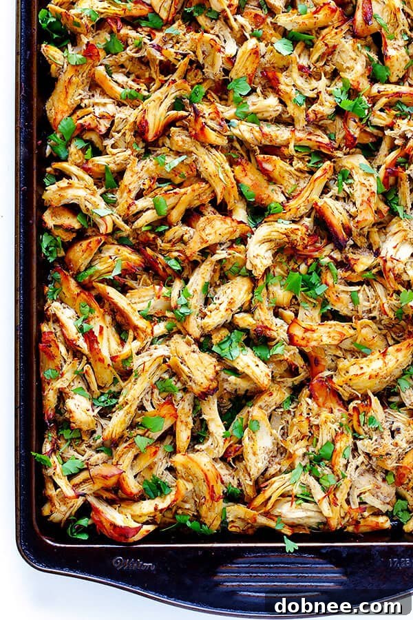 These Slow Cooker Crispy Chicken Carnitas are made easy by simmering for hours in the crock pot, then they're briefly crisped up in the broiler, resulting in tender, crispy, juicy, and absolutely DELICIOUS chicken carnitas. Perfect for tacos, burritos, or whatever sounds good! | gimmesomeoven.com