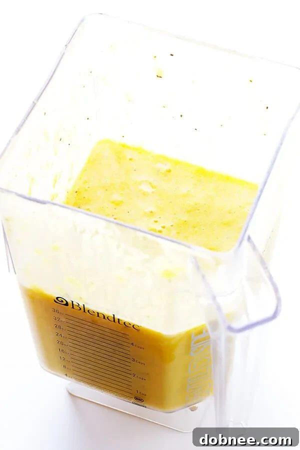 All smoothie ingredients are placed inside a blender, ready for blending.
