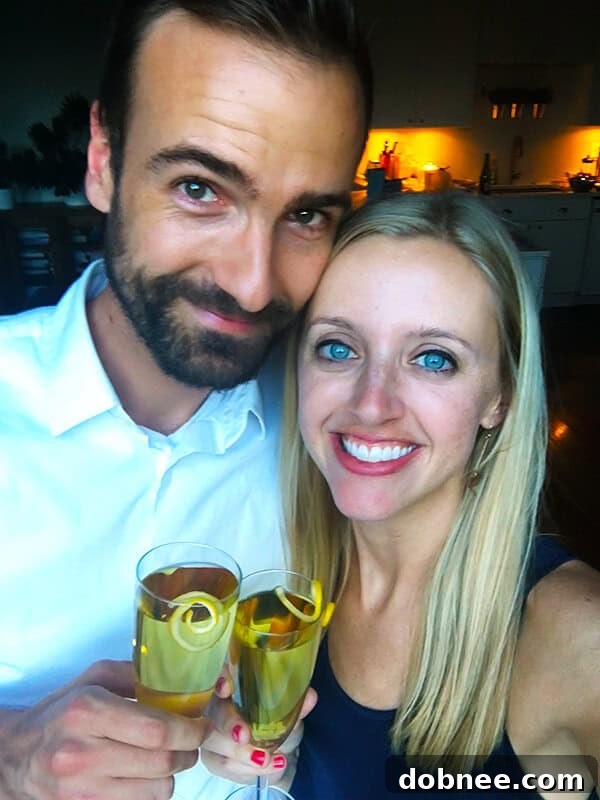 Refreshing French 75 cocktail made with champagne, gin, lemon, and simple syrup, garnished with a lemon twist.