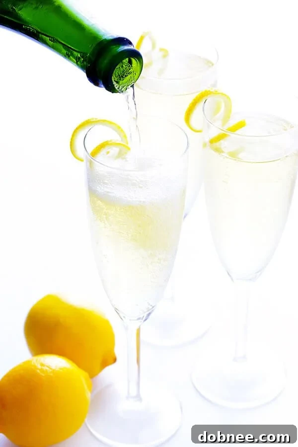 Close-up of a perfectly crafted French 75 cocktail in a flute, sparkling and elegant.
