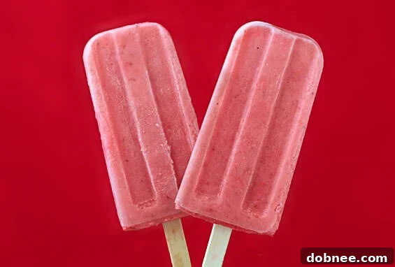Refreshing homemade Strawberry Lime Yogurt Popsicles, a healthy summer treat