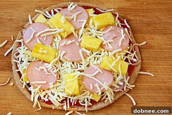 Hawaiian Pita Pizzas | gimmesomeoven.com Close-up of baked Hawaiian Pita Pizza