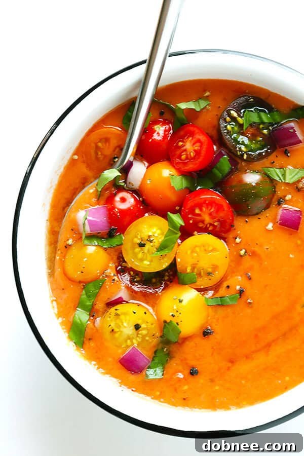 This 10-Minute Gazpacho Recipe is easy to customize with whatever veggies you have on hand, it's easy to make ahead of time, and it's absolutely delicious! Discover the ultimate refreshing cold soup for summer. | gimmesomeoven.com (Vegetarian / Gluten-Free)