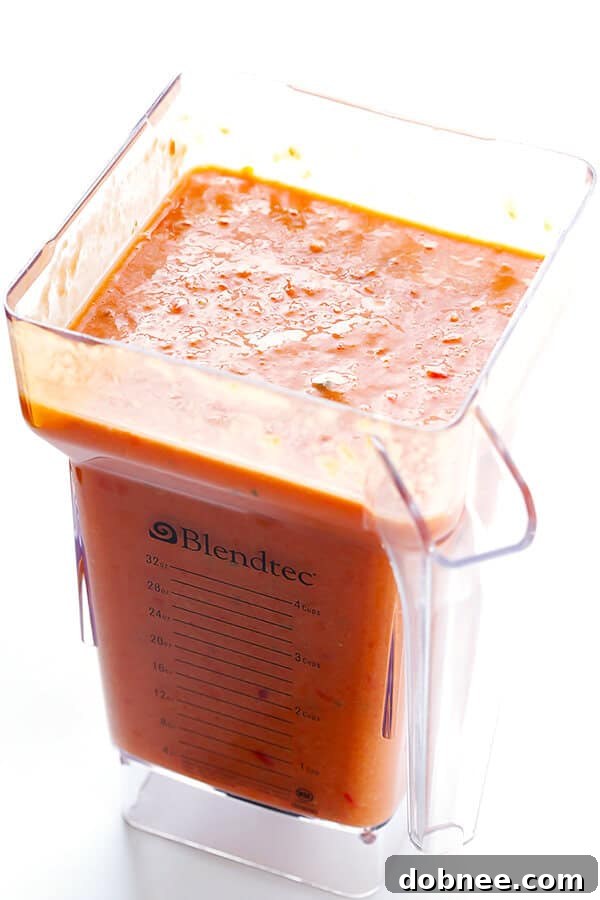 This 10-Minute Gazpacho Recipe is easy to customize with whatever veggies you have on hand, it's easy to make ahead of time, and it's absolutely delicious! Blend fresh vegetables and herbs for a refreshing meal. | gimmesomeoven.com (Vegetarian / Gluten-Free)