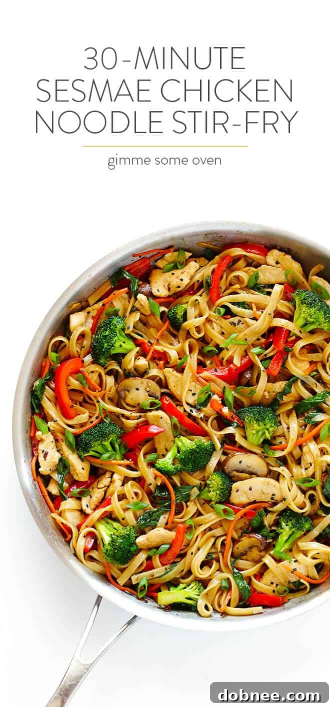 Full Bowl of Sesame Chicken Noodle Stir-Fry with Chopsticks