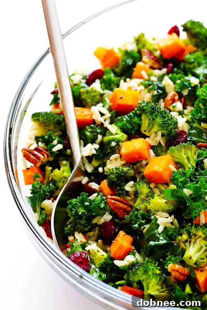 Autumn Kale Salad with Roasted Sweet Potatoes, Broccoli, and Brown Rice - a vibrant and hearty fall dinner idea.