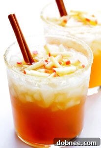 Smoky Apple Cider Mezcal Margarita, a visually appealing fall cocktail.