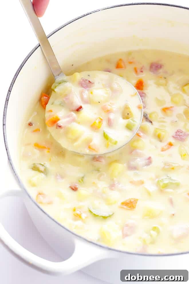 A heartwarming bowl of creamy ham and potato soup, perfect for cold weather.
