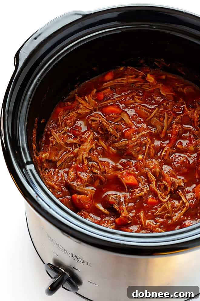 Slow Cooker Beef Ragu, quick and easy to prep, slow-simmered in a rich tomato sauce, perfect over pasta or polenta. A hearty comfort food recipe.