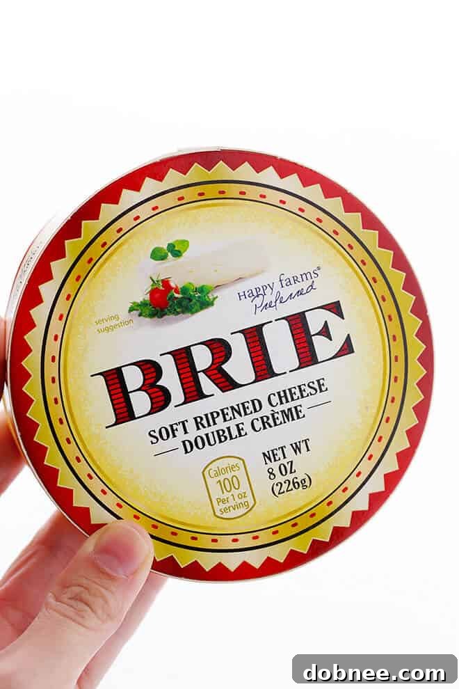 This 10-Minute Caramel Apple Baked Brie recipe is super-easy to make with just 3 ingredients, and it's the perfect appetizer for any party! | gimmesomeoven.com