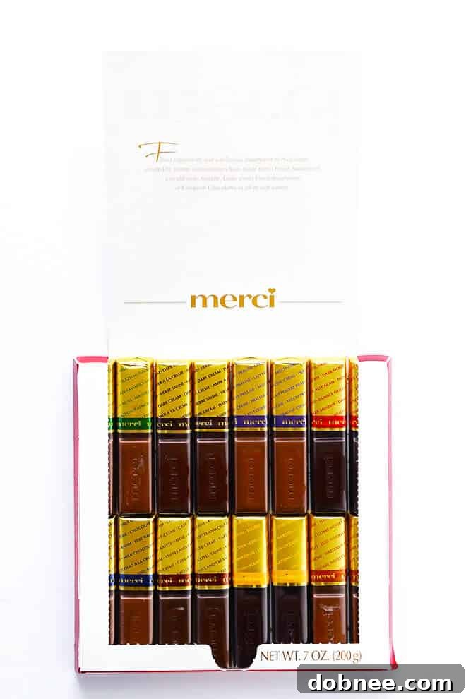 A box of merci chocolates, elegantly presented as a thoughtful thank you gift.