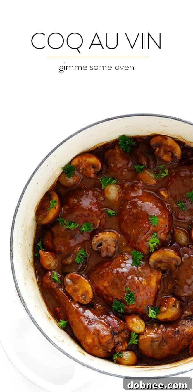 A serving of Coq Au Vin with tender chicken in red wine sauce.