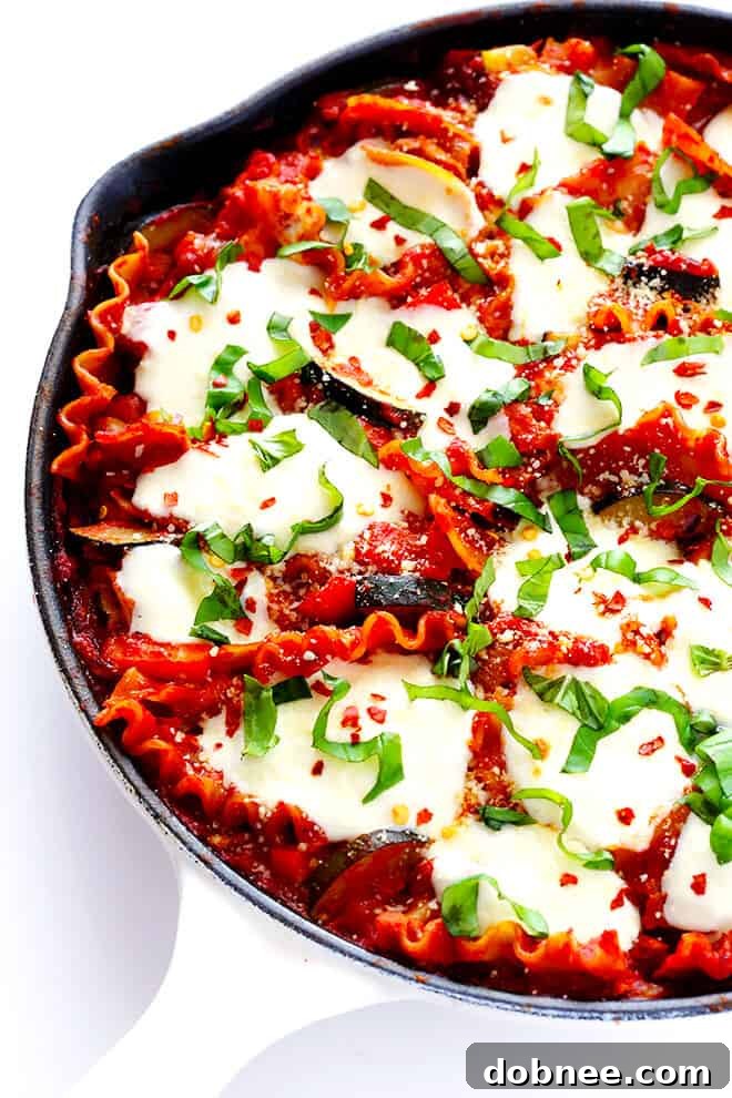 The final touch: melted mozzarella and fresh basil crown this delectable Skillet Veggie Lasagna.