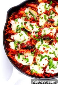 Delicious Skillet Veggie Lasagna with melted cheese.