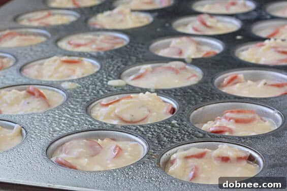 Close-up of baked pepperoni pizza puffs, golden brown and fluffy, ready for serving.