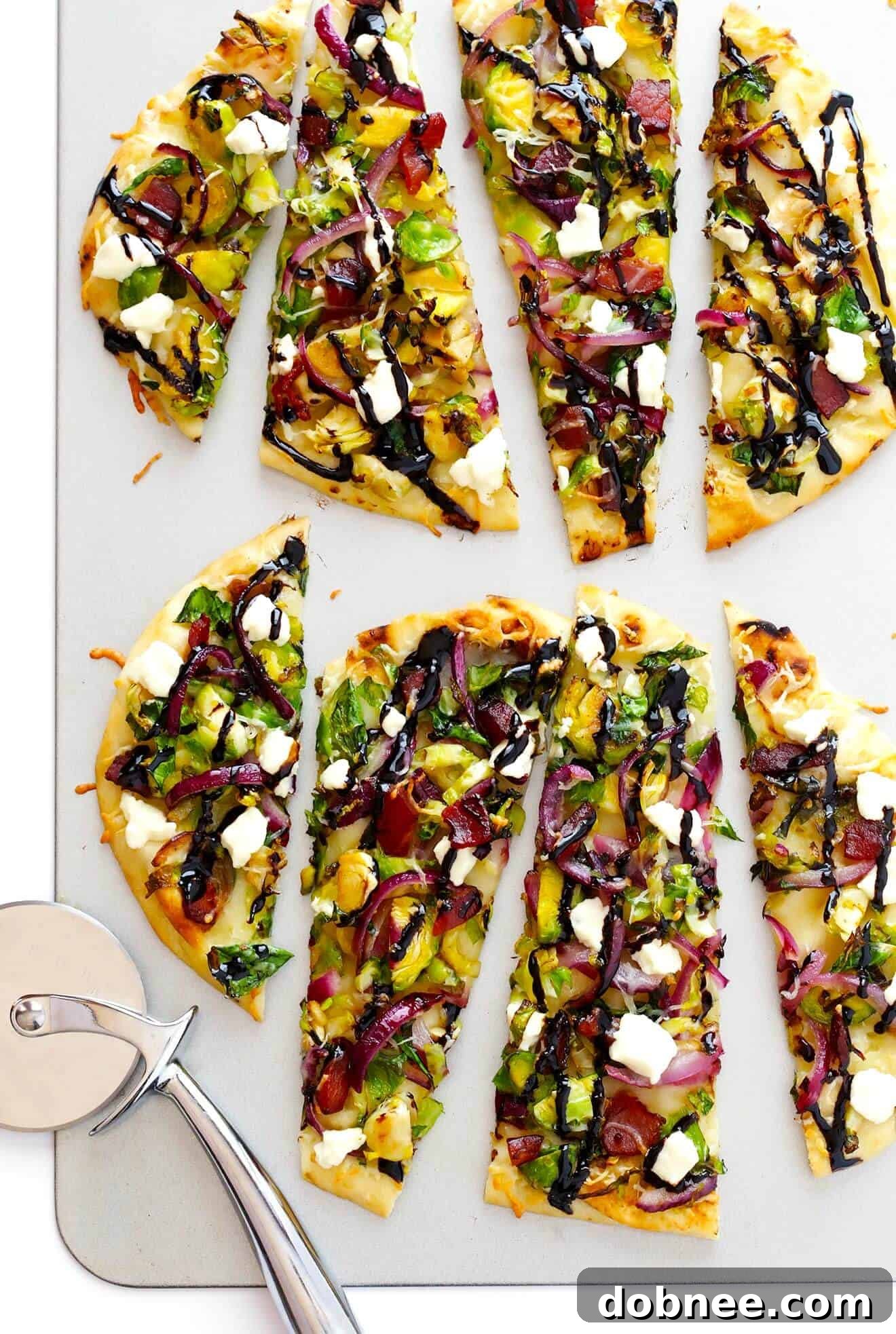 Delicious Brussels Sprouts, Bacon, and Balsamic Flatbread Pizza ready to serve in under 30 minutes. A perfect quick and easy meal or appetizer.
