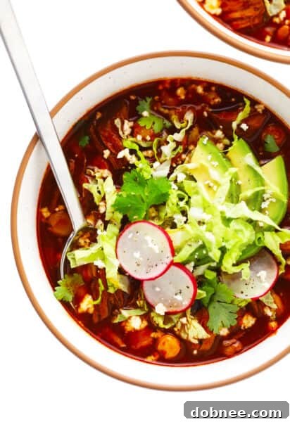 Pozole Rojo with rich red broth, tender pork, and hominy