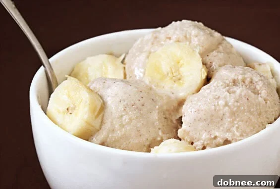Homemade Spiced Banana & Brown Sugar Ice Cream swirled in a bowl