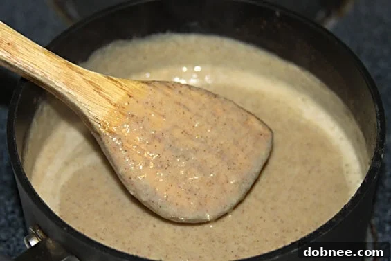 Close-up of Spiced Banana & Brown Sugar Ice Cream with a scoop